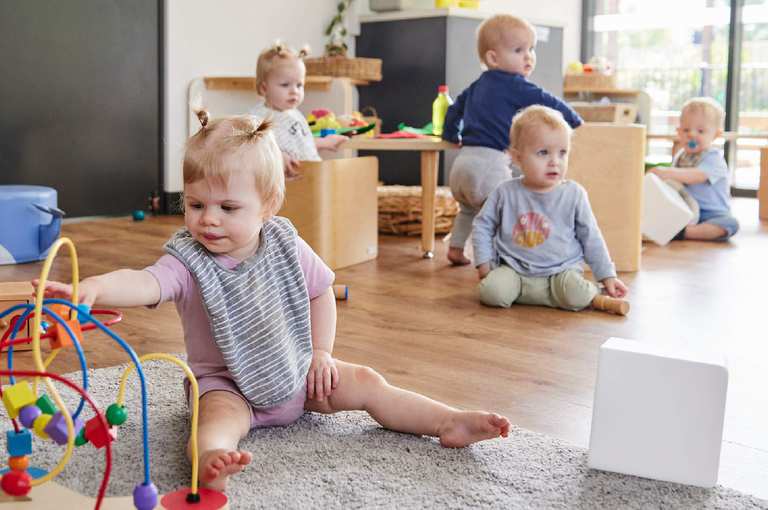 What is the Best Age to Start Child Care Are they too Young? Toddle